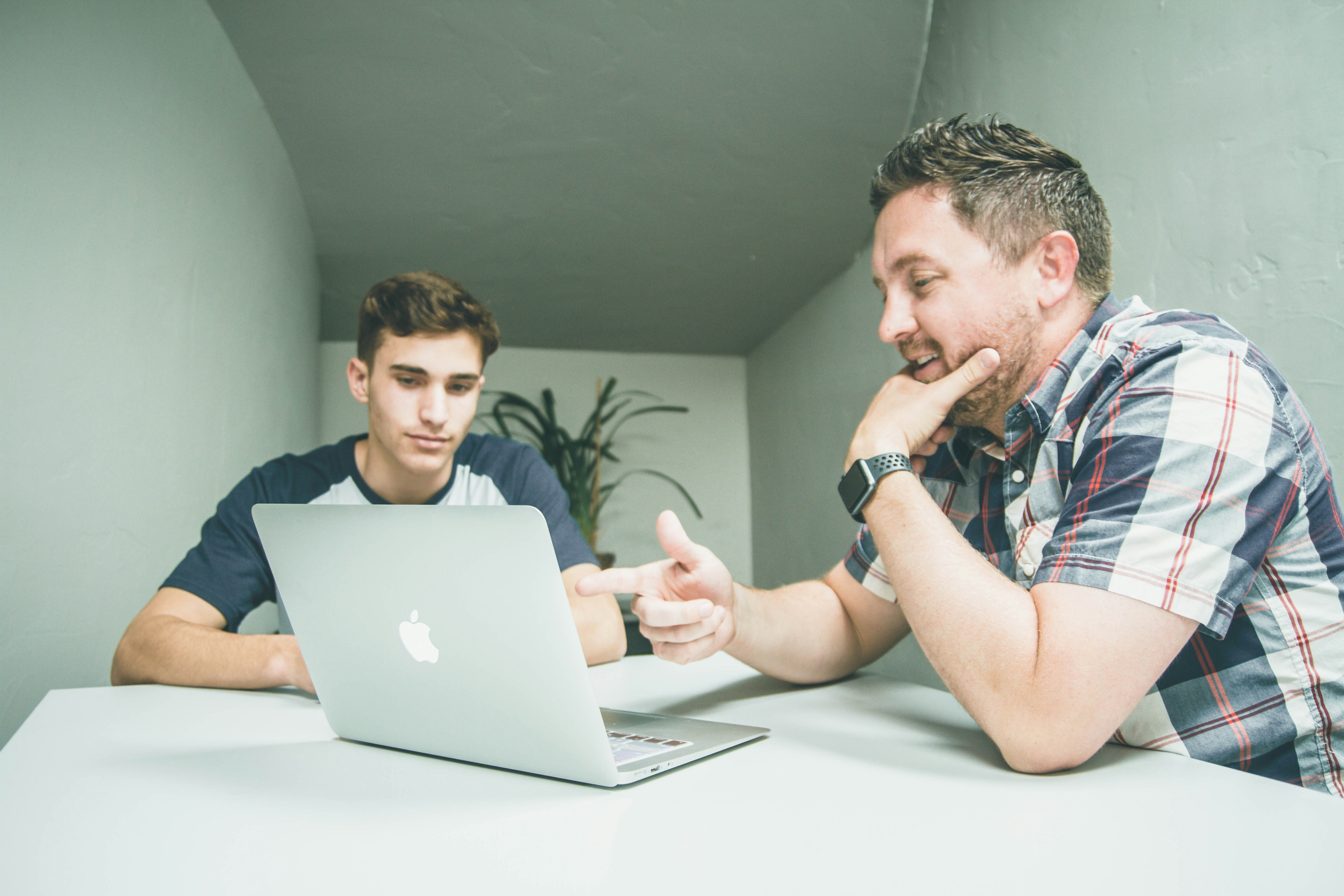 Tutor working with student
